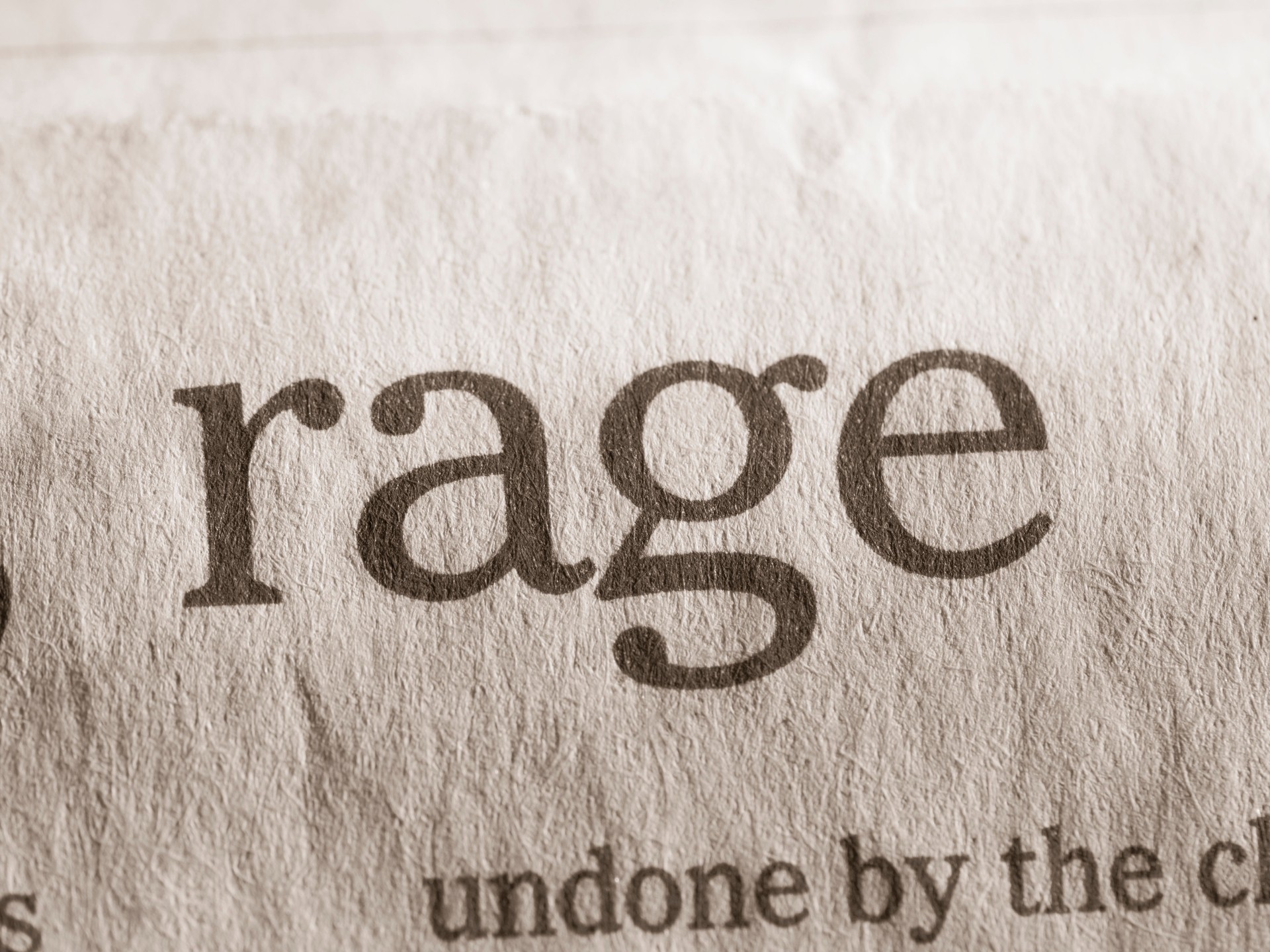 Word rage written in a newspaper